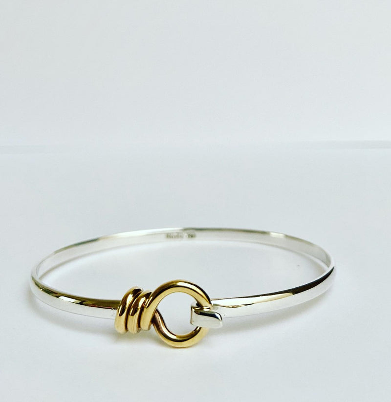 Gold loop bangle