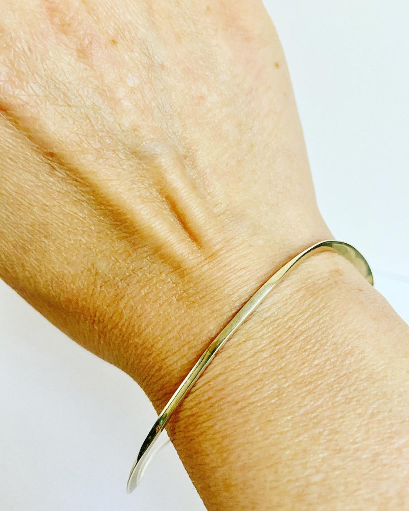 Slim line oval bangle