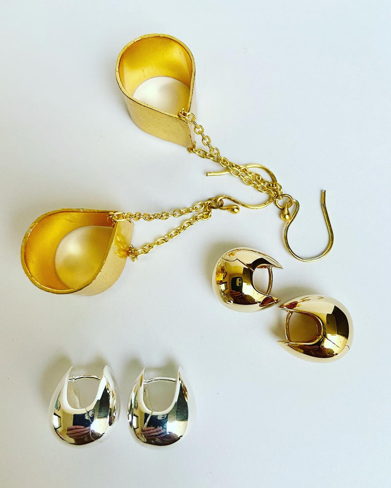 Graduated gold huggie hoops