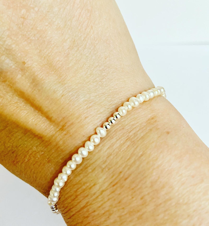 Stretch mini pearl bracelet with silver ball accent