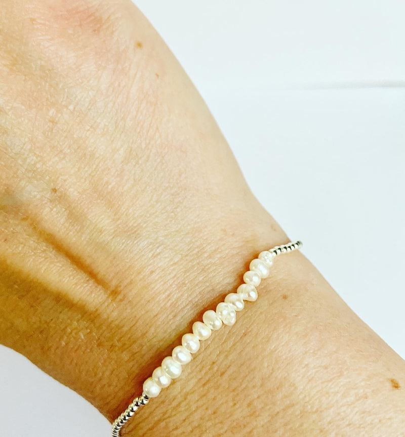 Silver Stretch bracelet with pearls at front